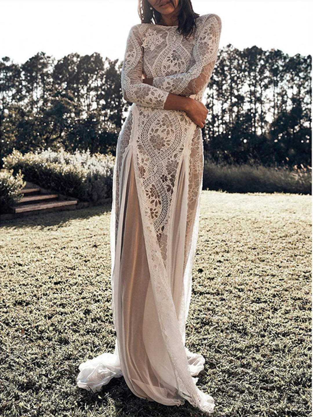 Elegant sheath beach wedding dress with 3/4 sleeves and appliques.