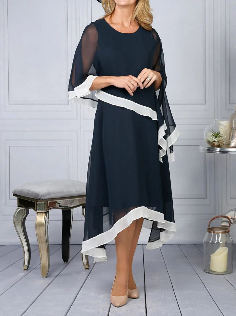 Elegant sheath boat neck sleeveless ankle-length gown.