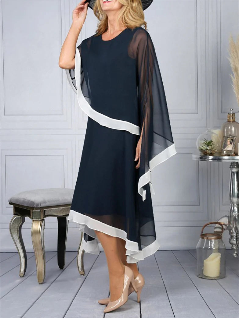 Back view of the sophisticated ankle-length gown.