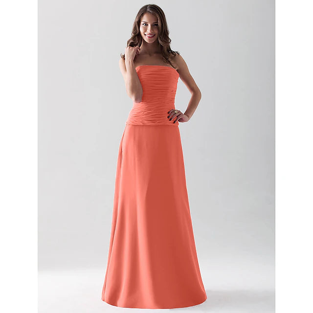 Back view of a floor-length chiffon bridesmaid dress with an open back.