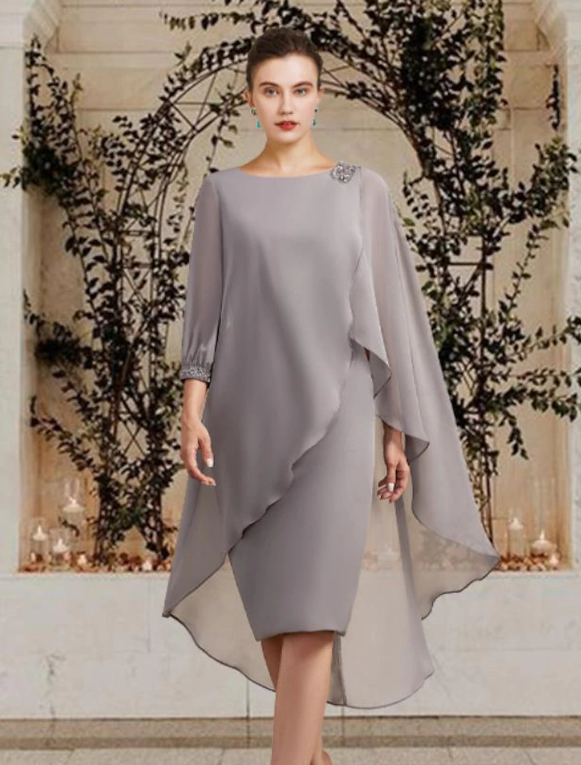 Elegant sheath chiffon Mother of the Bride dress with jewel neck and 3/4 sleeves, front view.