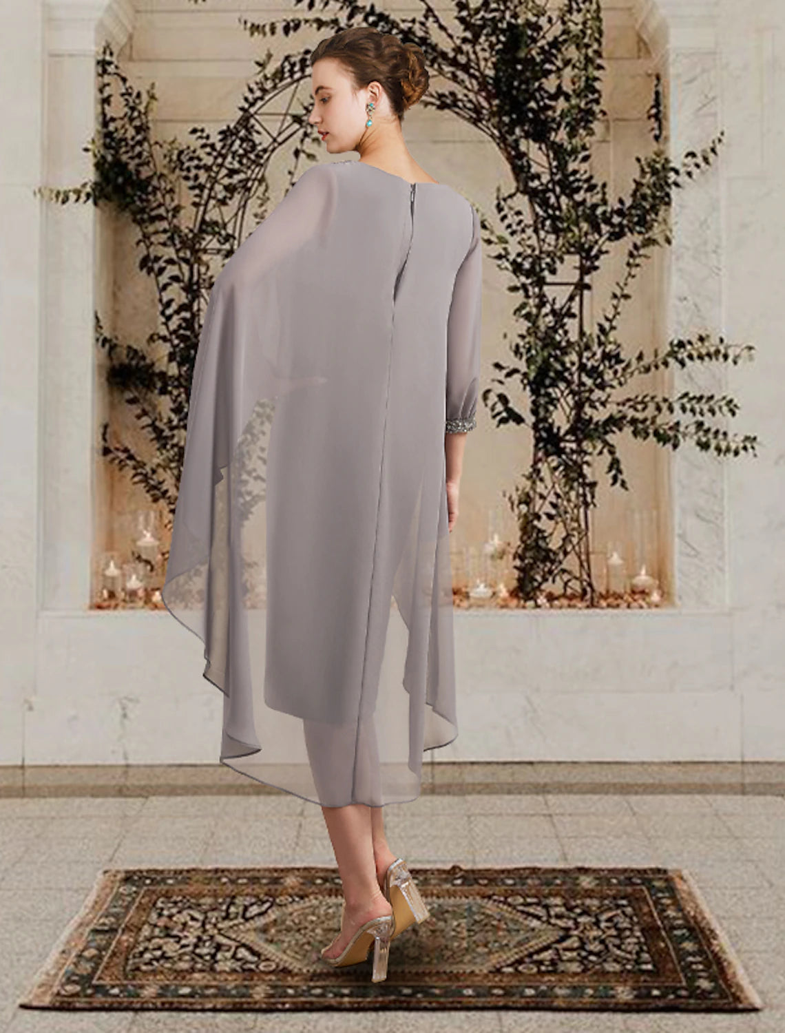Back view of the elegant sheath chiffon dress, showing floor length and subtle embellishments.