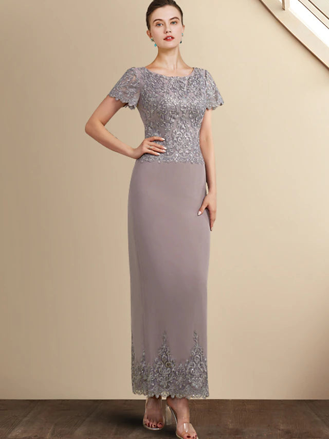 Side view of the elegant sheath dress, highlighting the short sleeves and fabric detail.