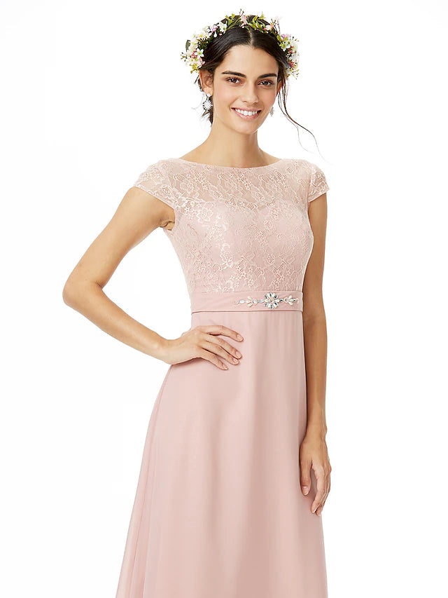 Full length view of elegant bridesmaid dress with flowing chiffon skirt.