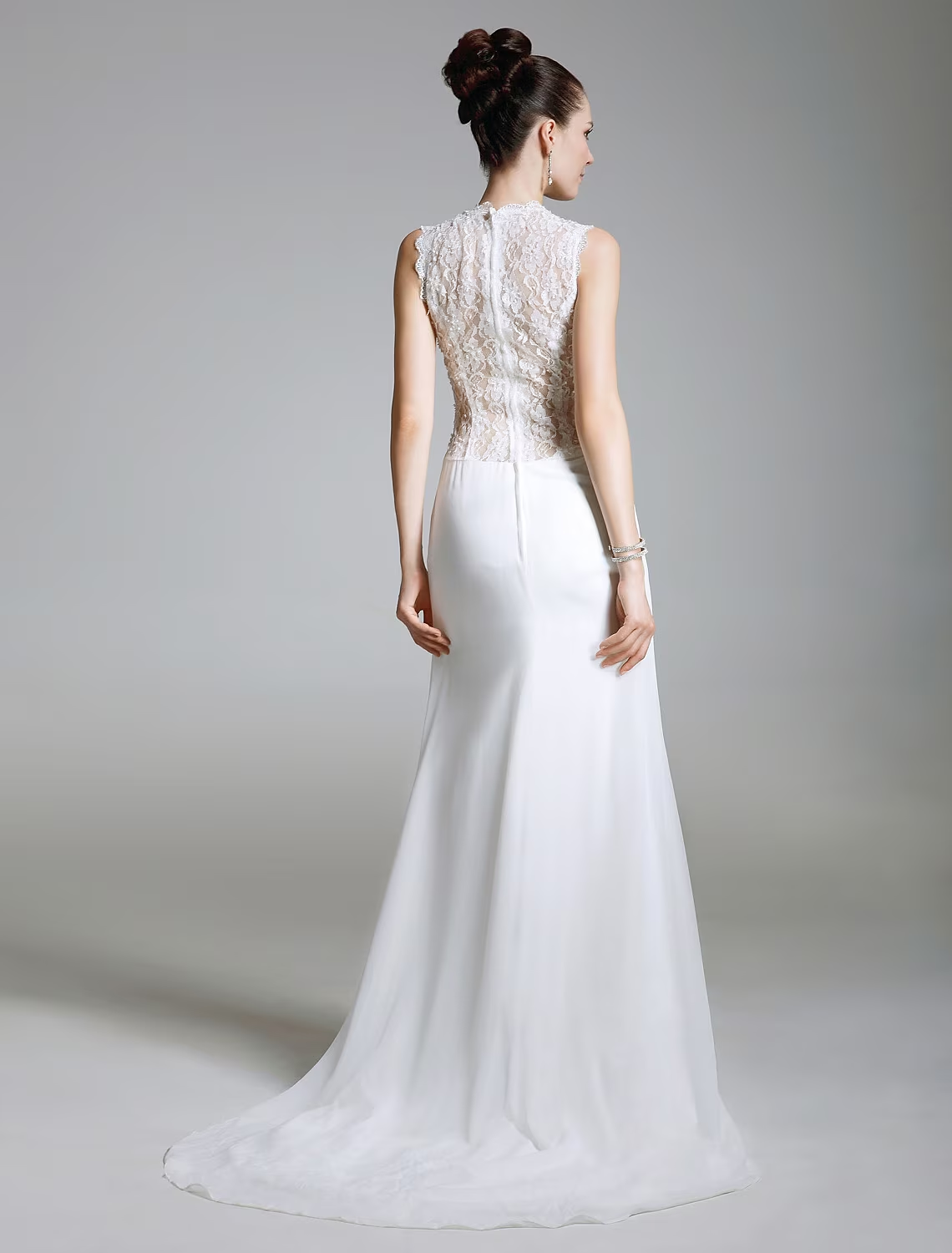 Formal chiffon gown with sweep train and delicate lace detailing.