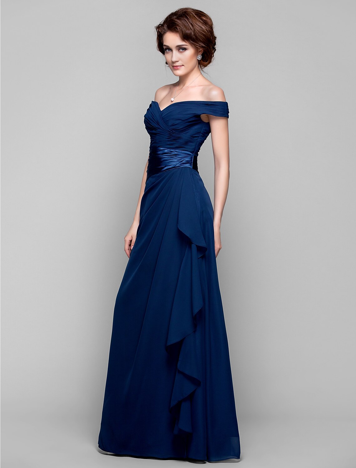 Side view of a dark blue off-shoulder sheath column dress, highlighting the silhouette.