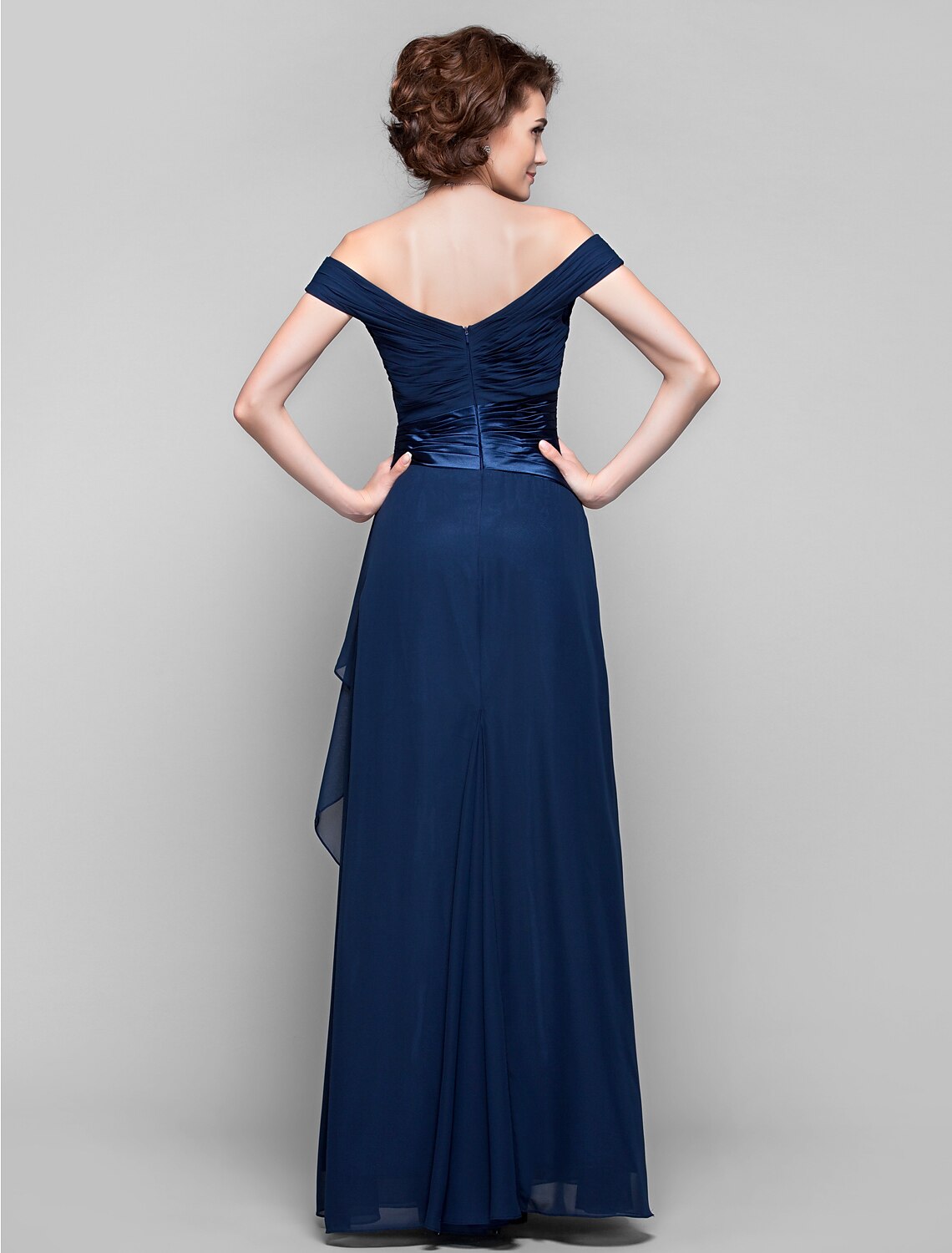 Close-up of the off-shoulder neckline and bodice of a dark blue dress.