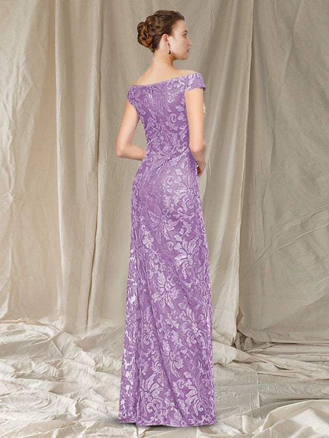 Close-up of the delicate lace cap sleeves and intricate appliques on the elegant Mother of the Bride dress.