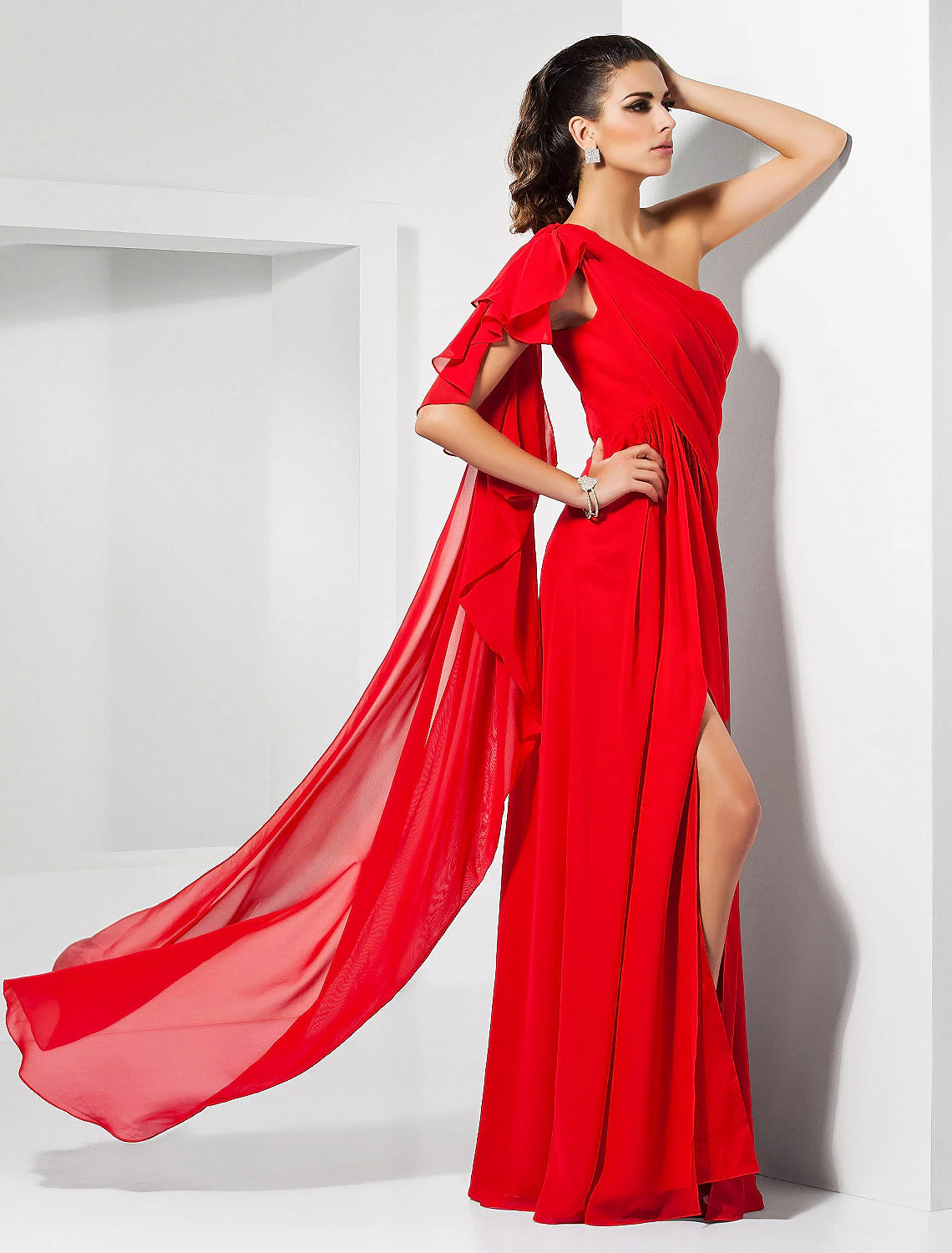 Model posing in the blue one-shoulder evening gown, showcasing the silhouette.