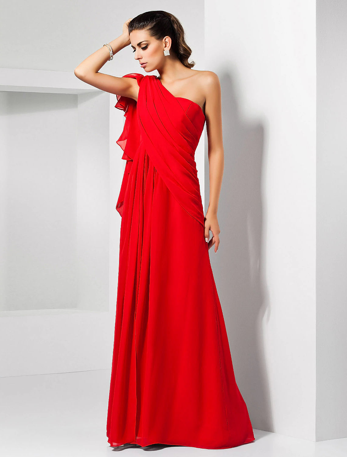 Detail of the fabric and draping on the blue formal dress.