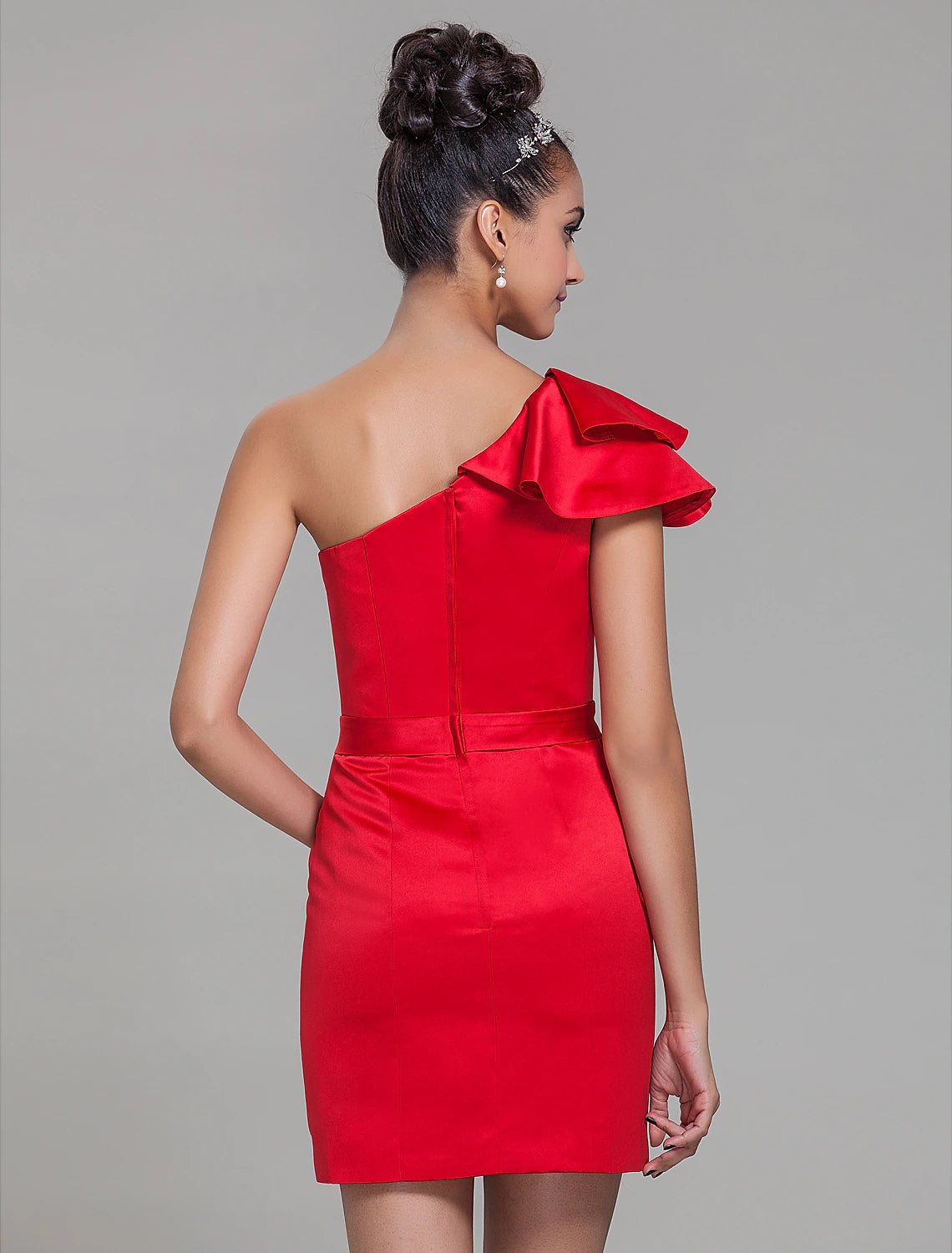Model posing in the chic one-shoulder satin dress, showcasing its elegant drape.