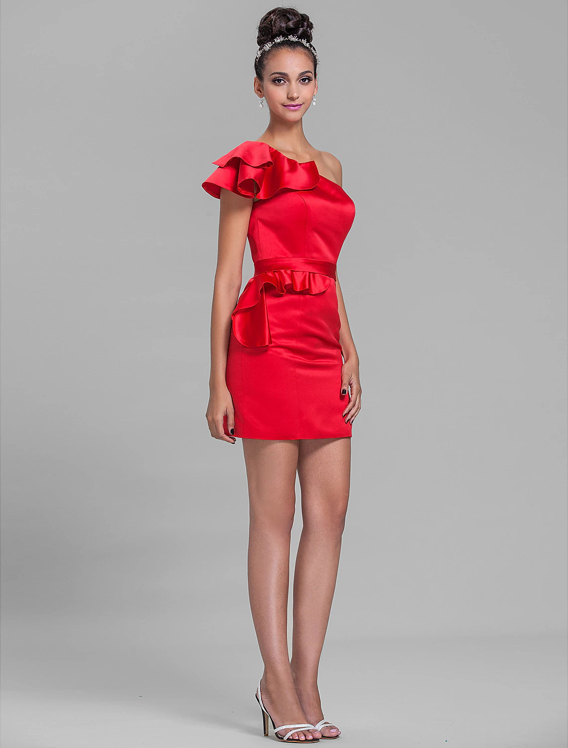 Model smiling in the stylish one-shoulder short satin dress, suitable for weddings.