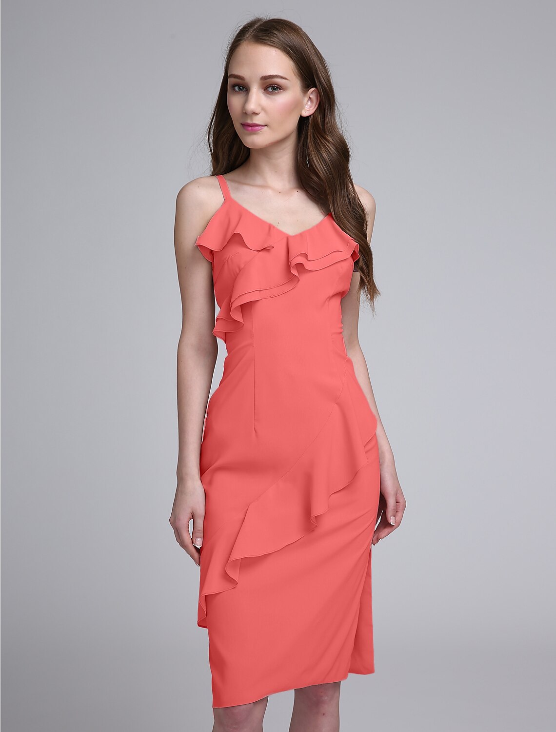 Close-up of chiffon fabric and ruffle detail on a bridesmaid dress.