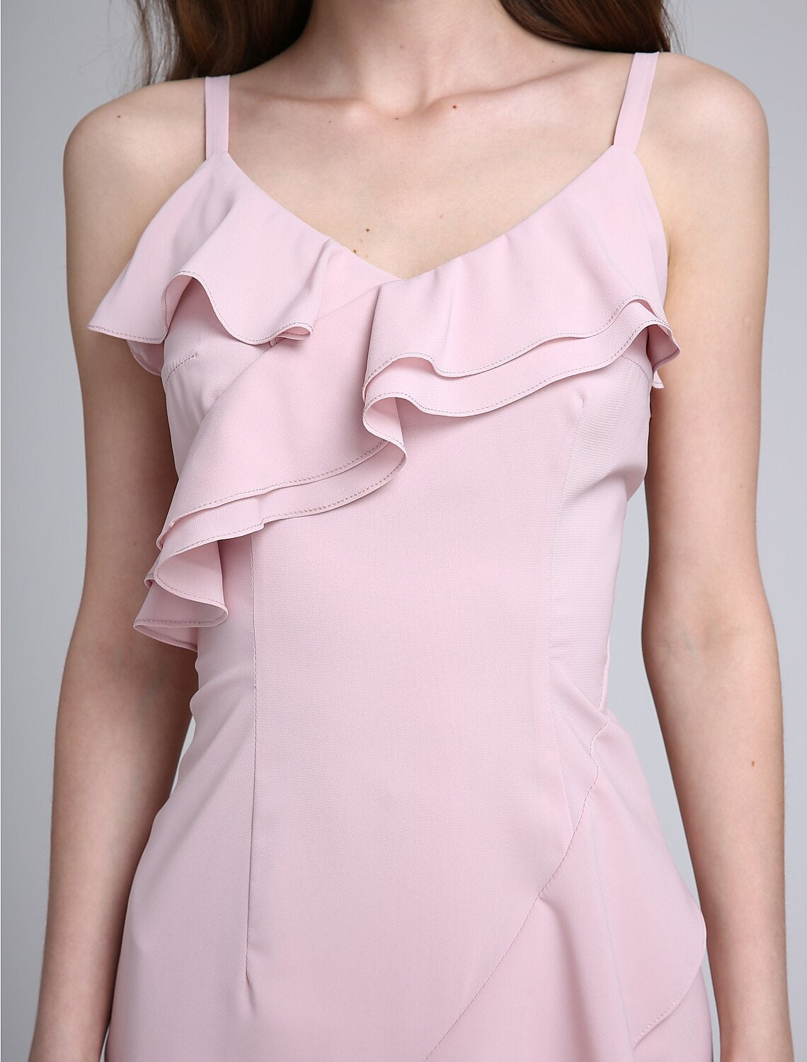 Bridesmaid dress with spaghetti straps and a graceful silhouette.