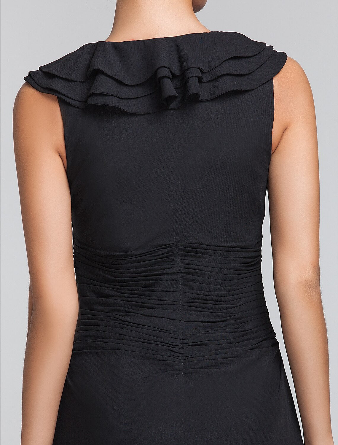 Side view of a square neck chiffon dress.