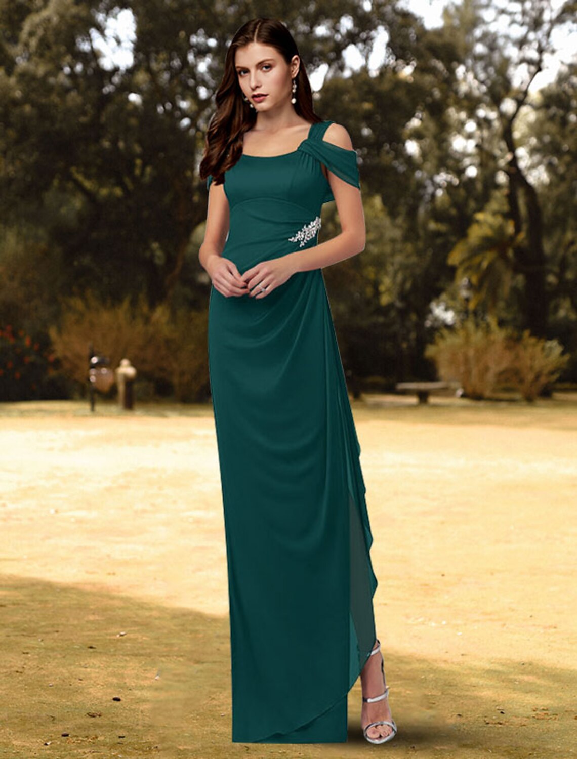 Elegant floor-length sheath column evening gown with square neck and short sleeves.