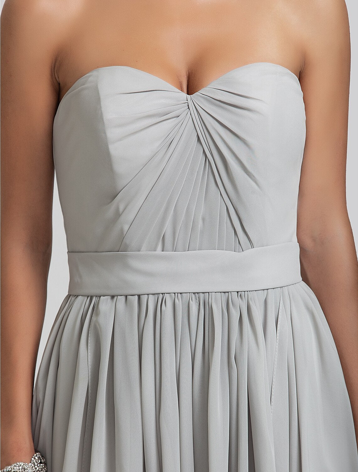 Close-up of the sweetheart neckline and bodice of the bridesmaid dress.