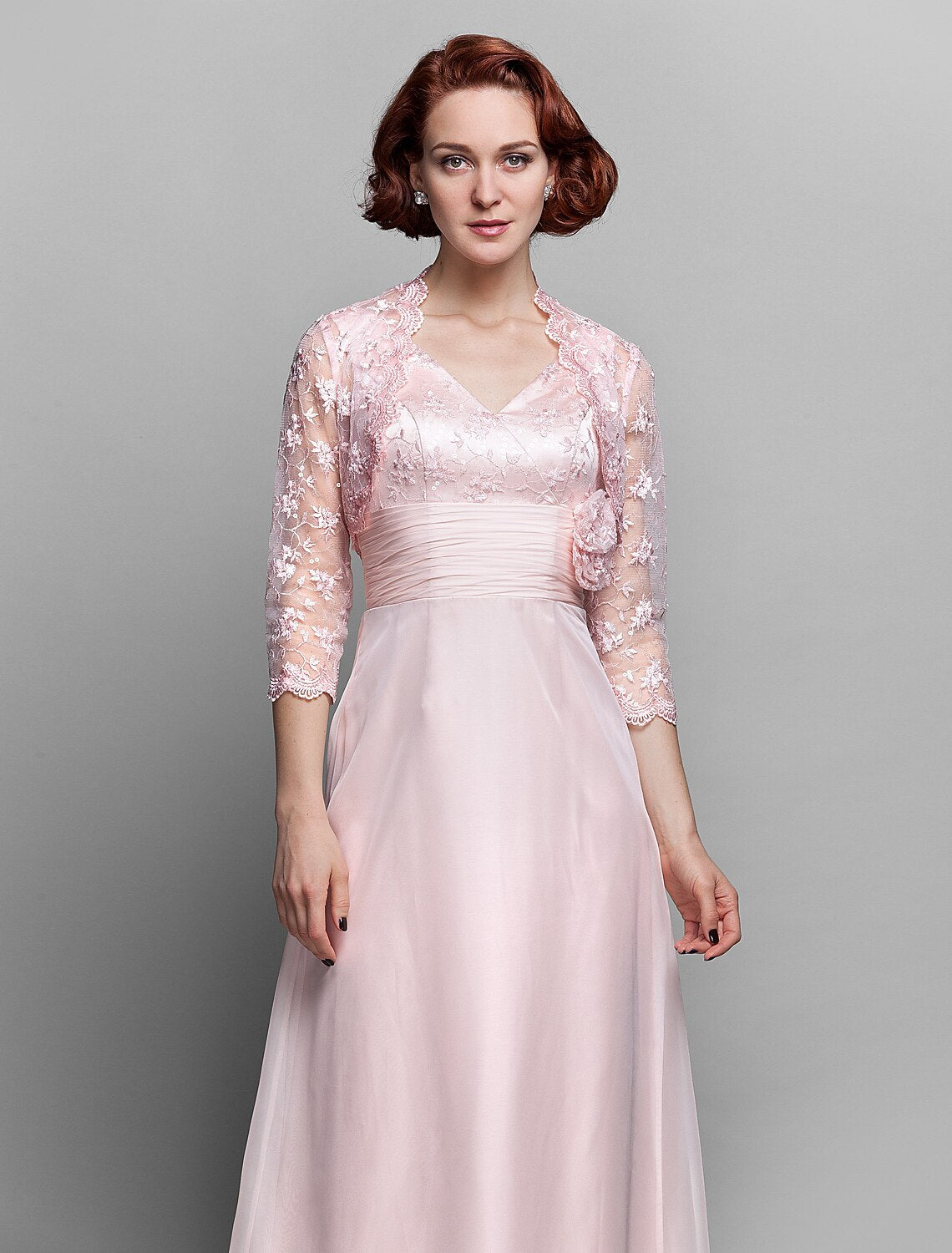 Detail of the 3/4 length sleeve with a decorative bow.