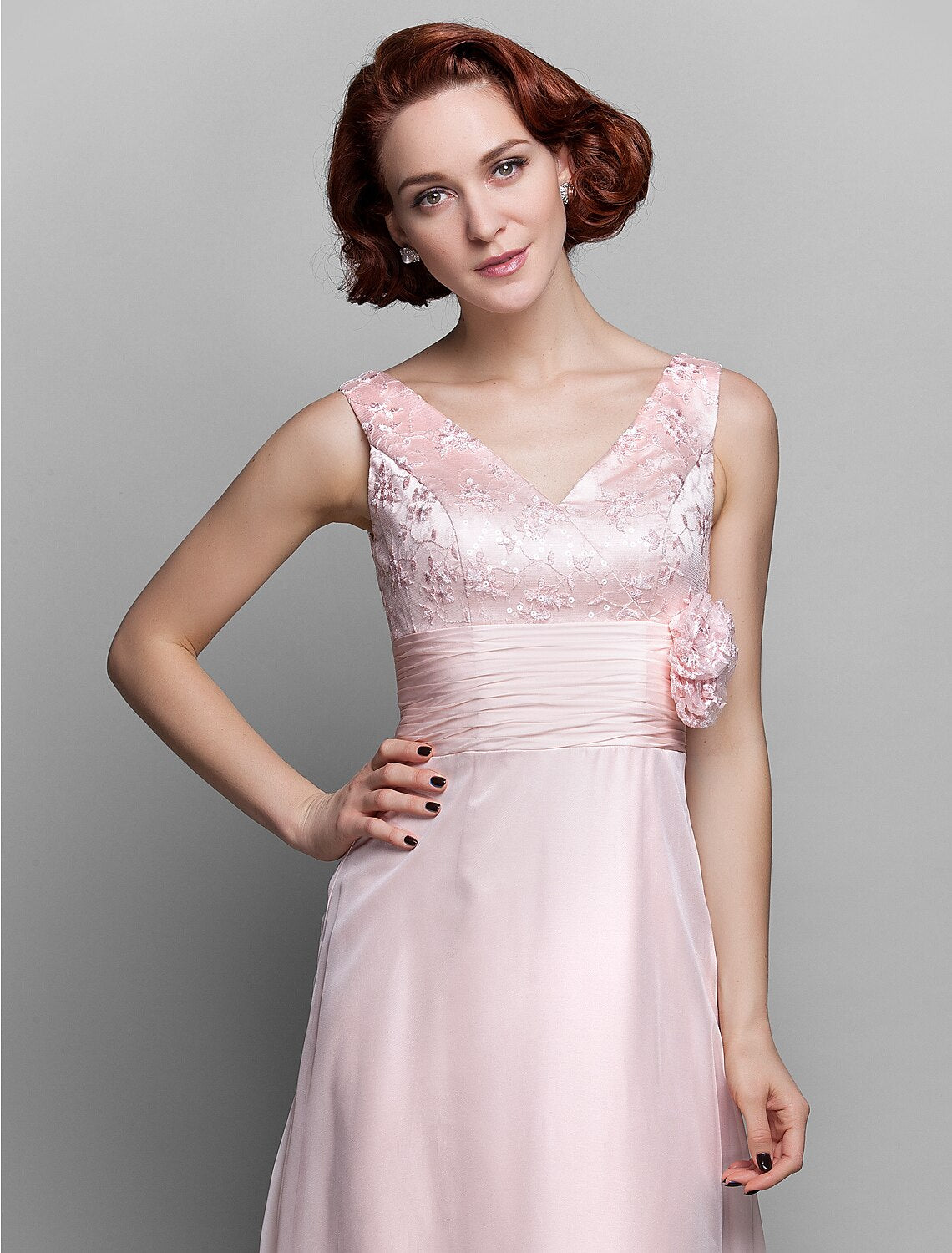 Close-up of the ruched detailing on the dress bodice.