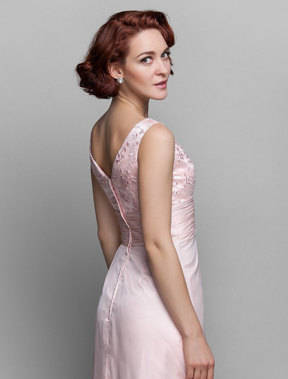 Bottom hem of the ankle-length chiffon and lace dress.