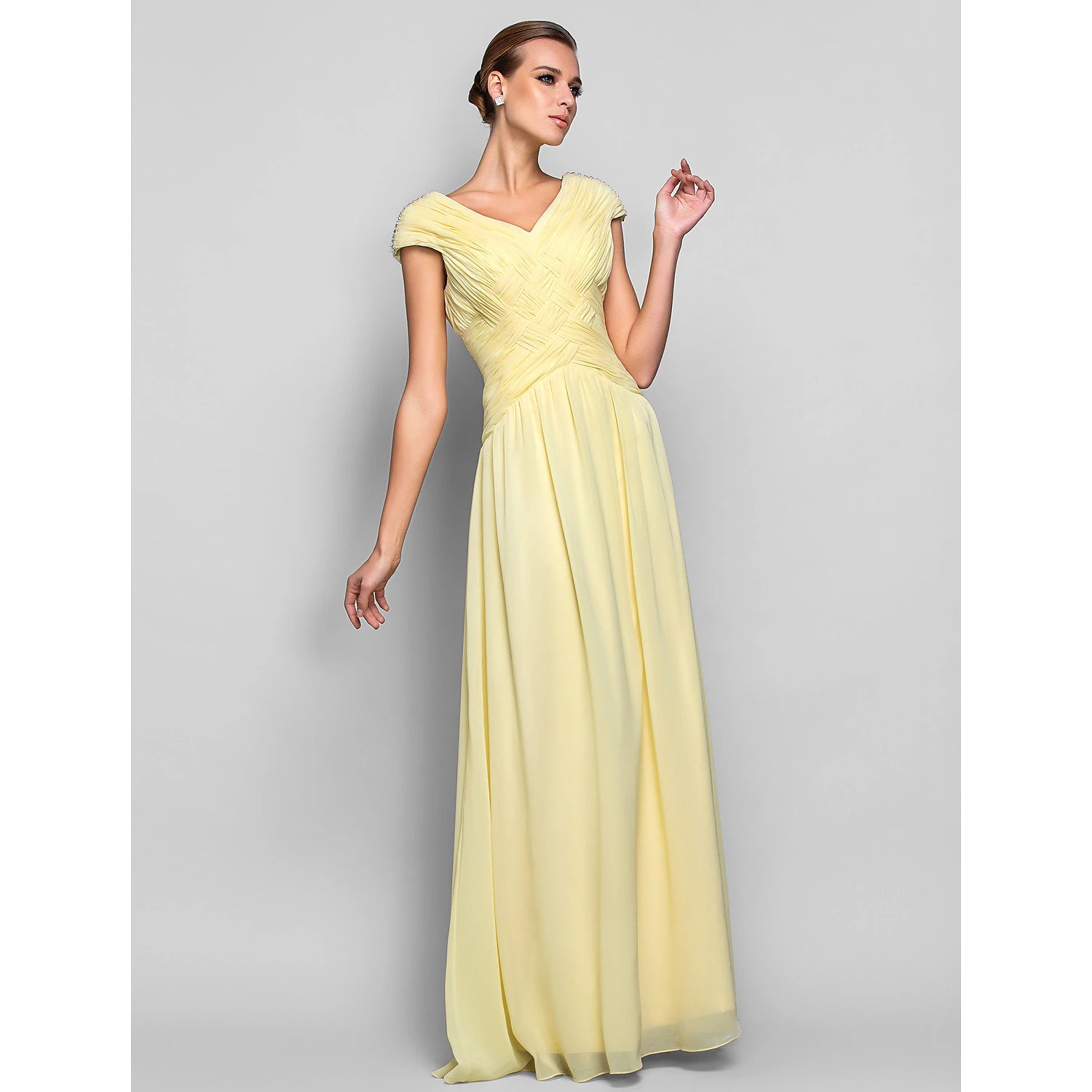 Elegant sheath column V-neck short sleeve chiffon prom dress with criss-cross crystals.