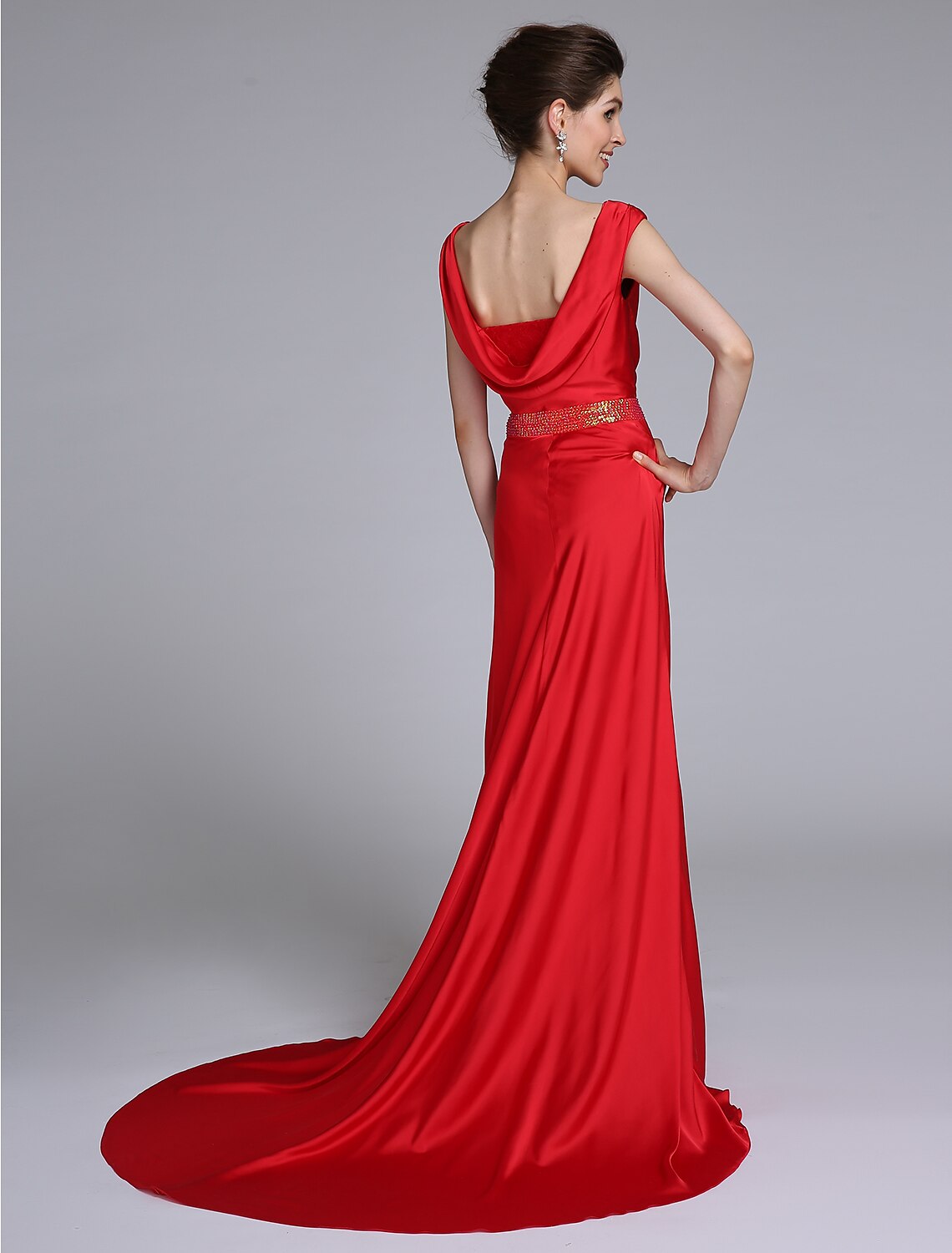 Back view of the taffeta Mother of the Bride dress showing open back and court train.