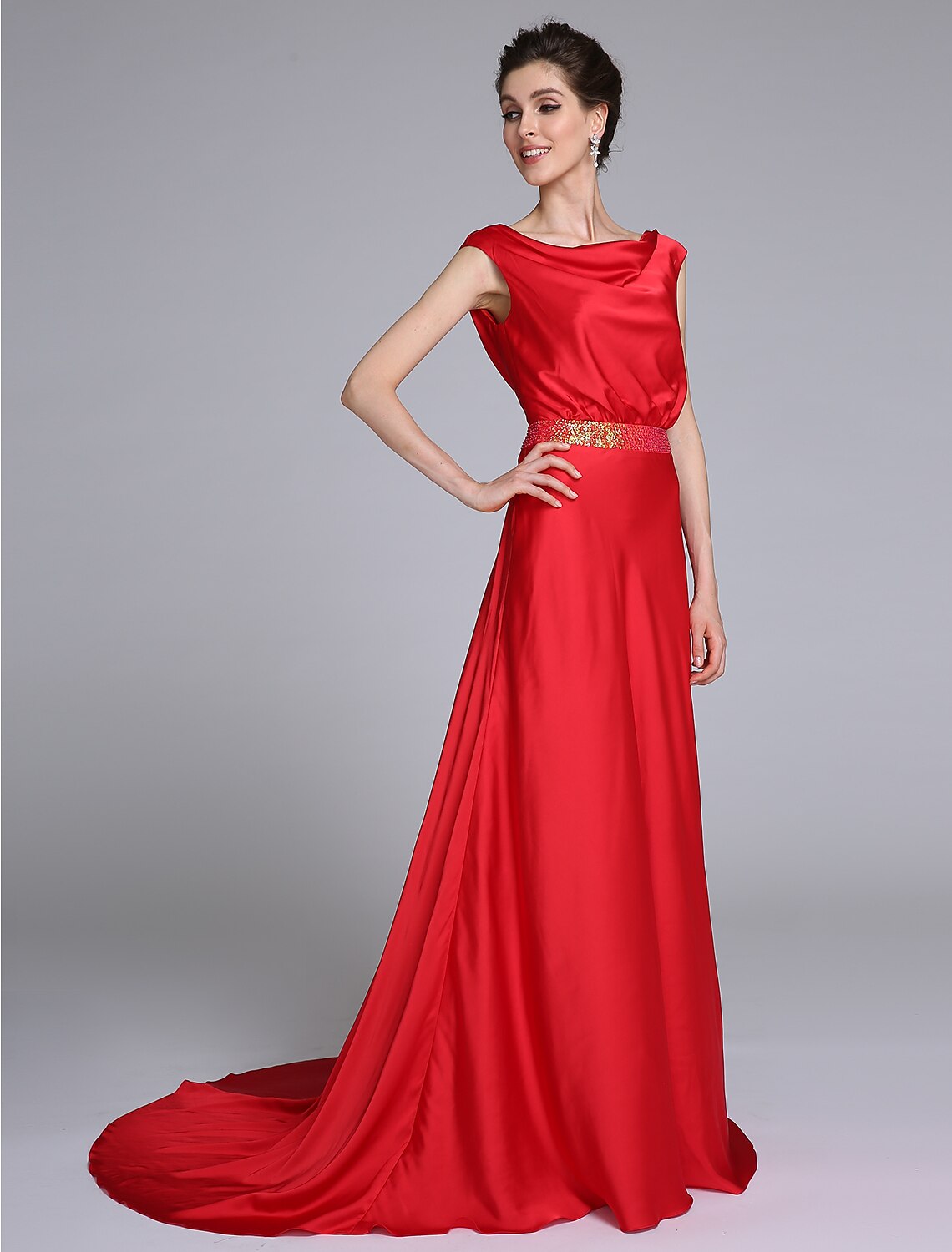 Close-up of the cowl neck and delicate beading on the taffeta dress.