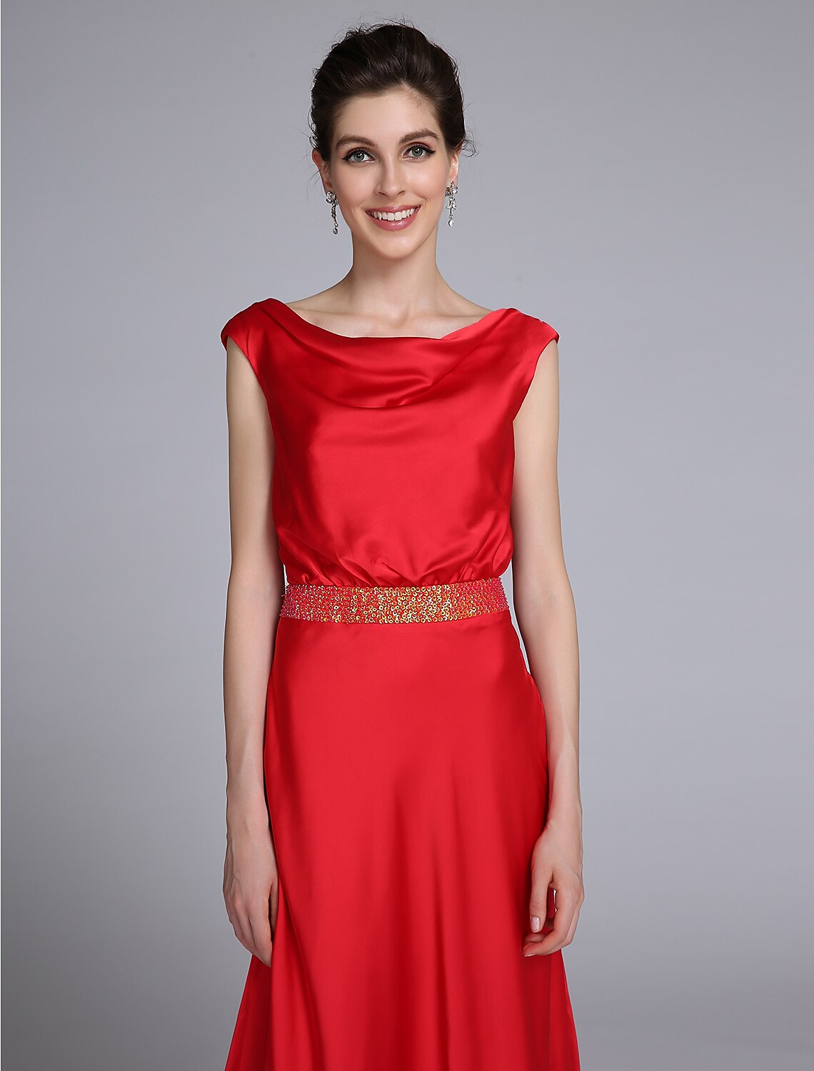 Side view of the sleeveless taffeta Mother of the Bride gown.