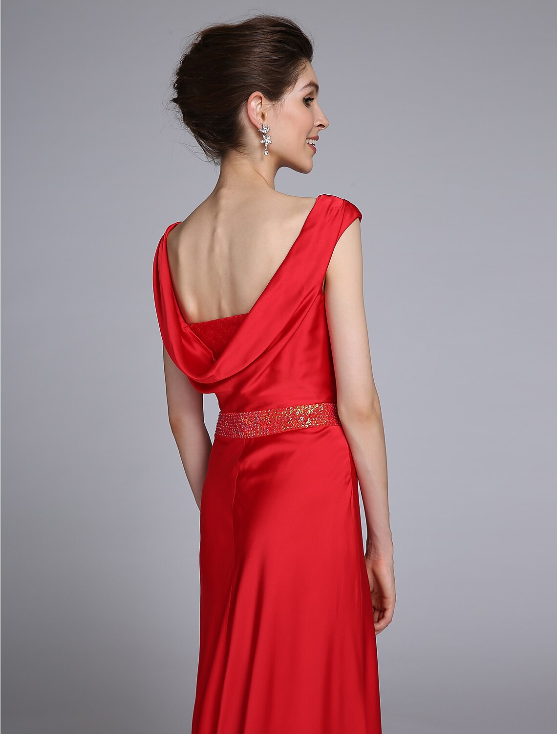 Detail of the taffeta fabric and beading on the elegant dress.
