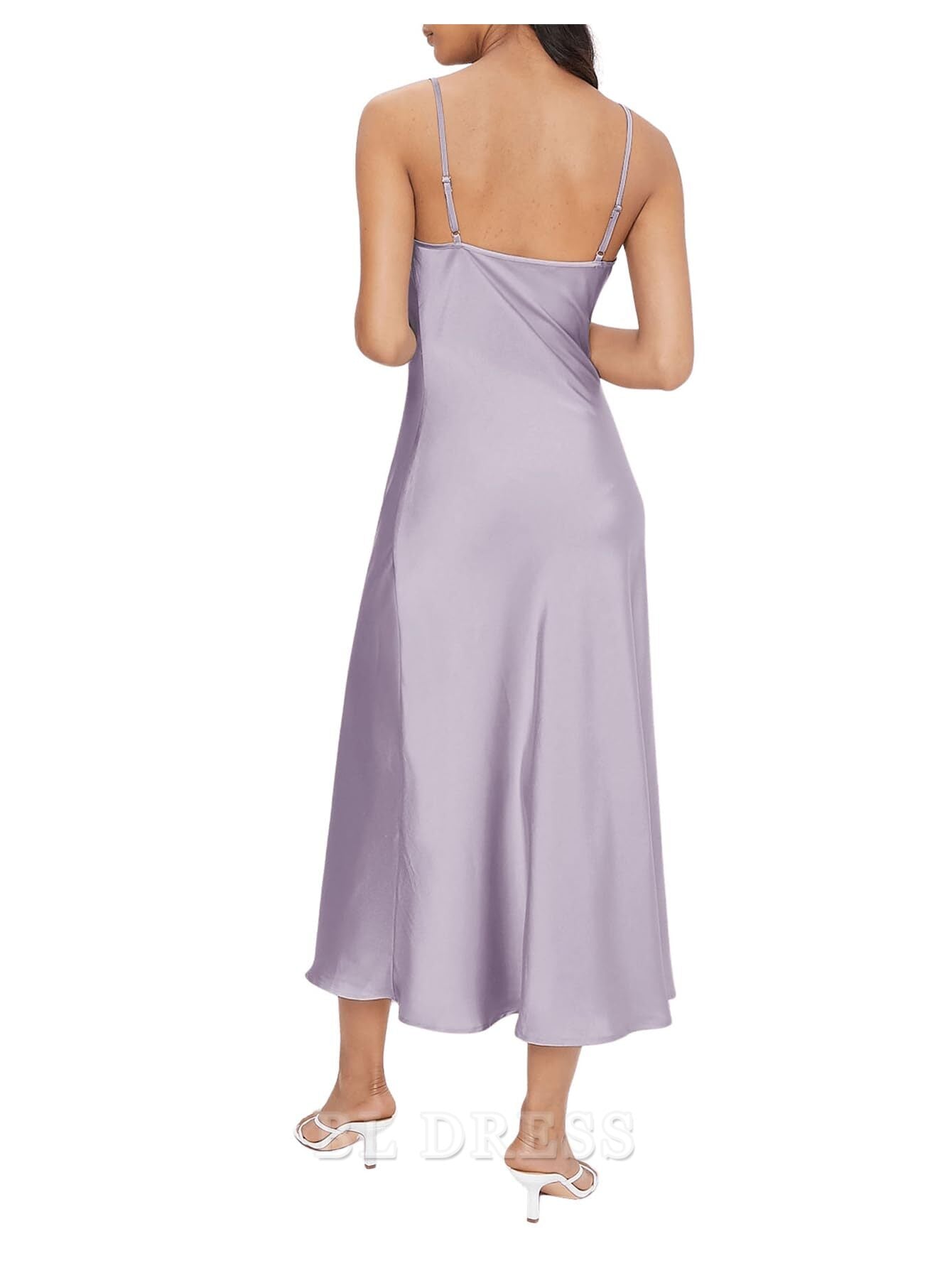 Side view of a long satin slip dress, highlighting the flowing fabric.