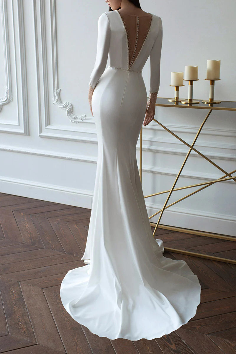 Satin wedding gown with court train, side view.