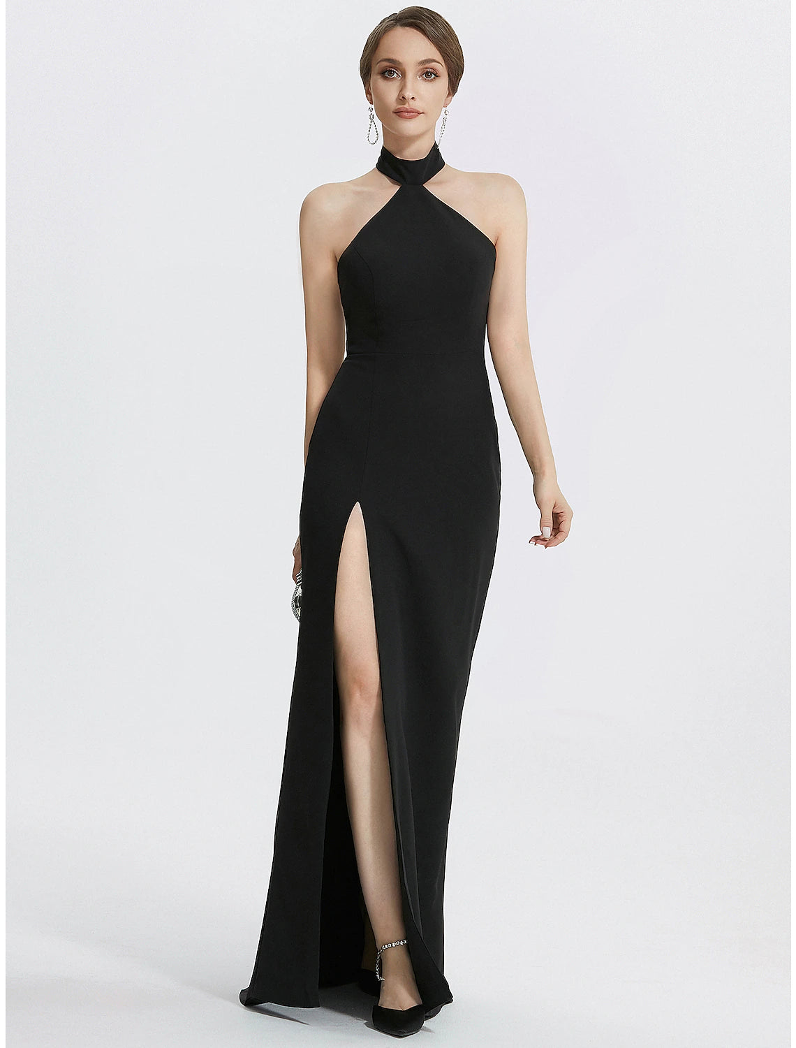 Elegant black sheath halter neck evening gown with ruched details.
