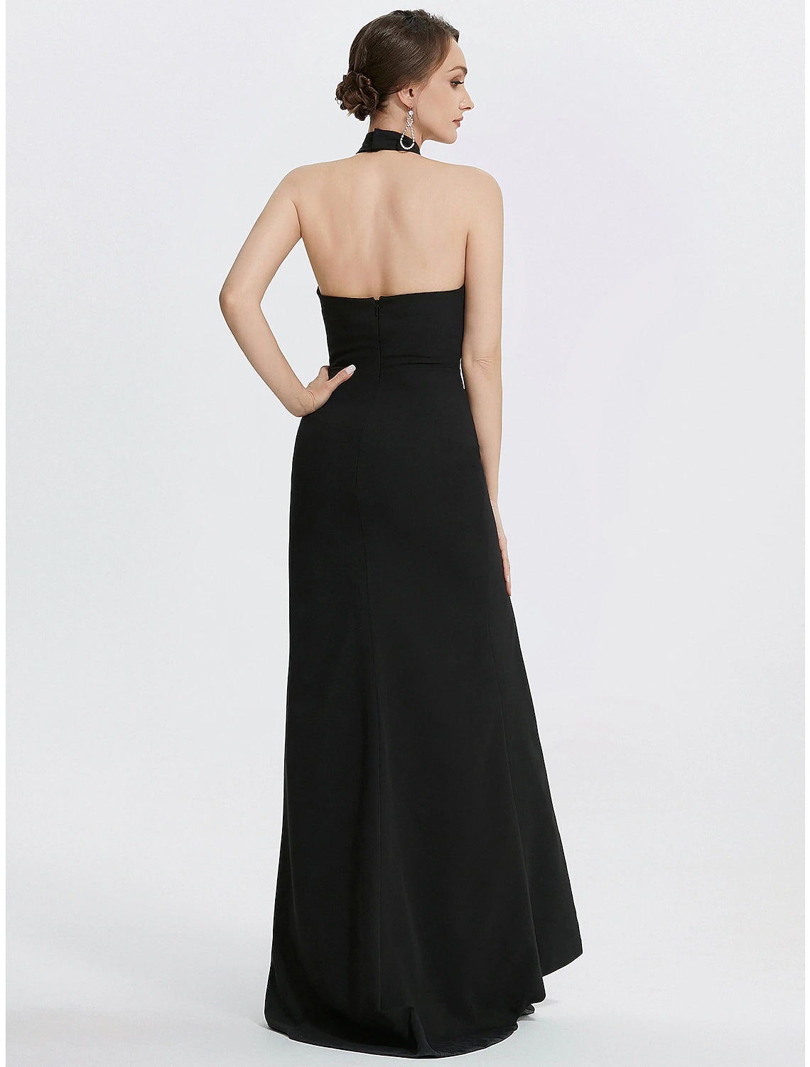 Back view of the black floor-length sheath dress.