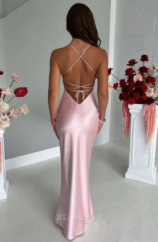 Pink satin halter neck formal dress with a flowing silhouette.