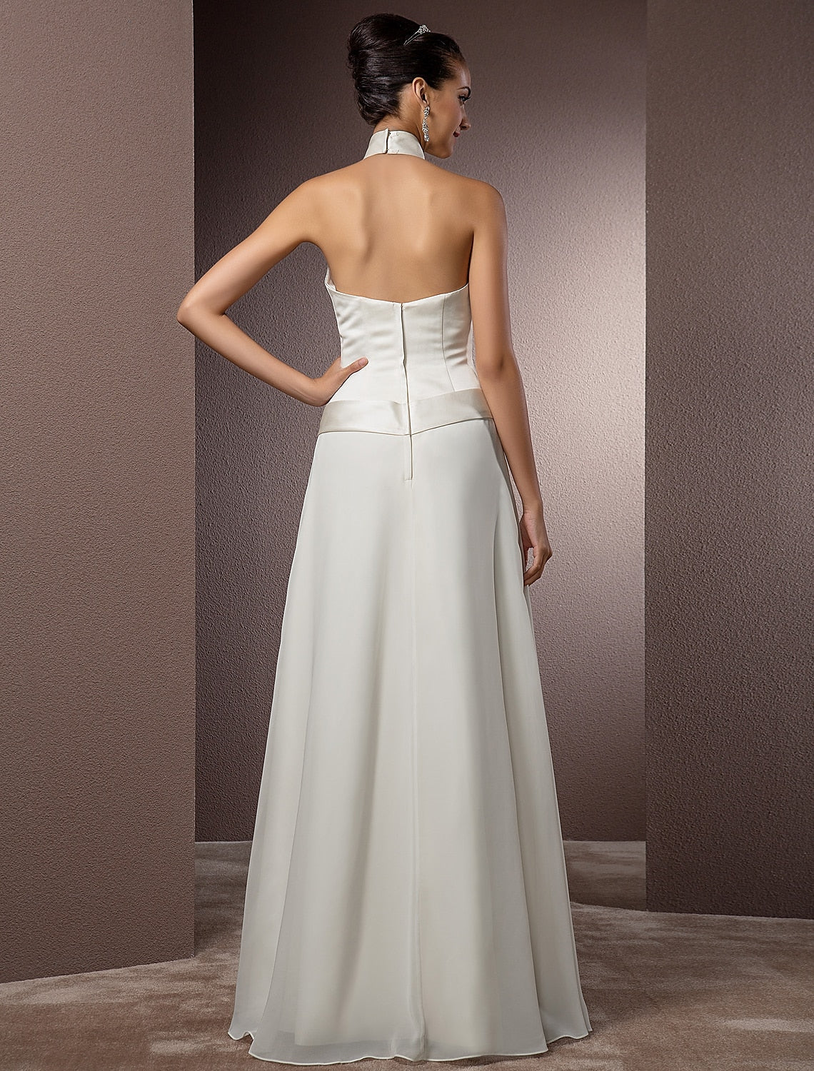 Back view of satin halter wedding gown.