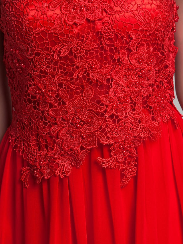 Model wearing the backless halter dress.