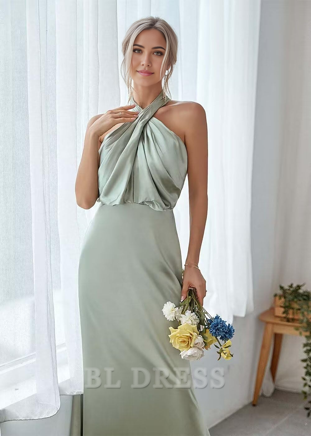 Close-up of the pleated satin fabric on the halterneck formal dress.