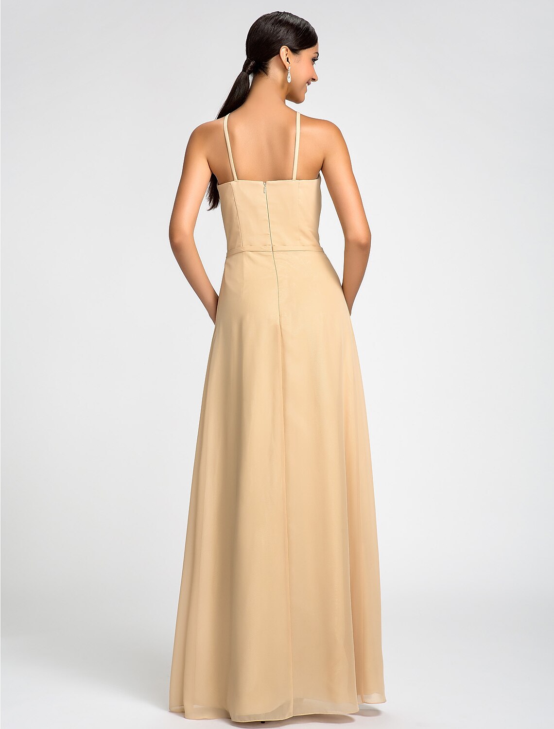 Back view of a high neck chiffon bridesmaid dress with delicate draping.