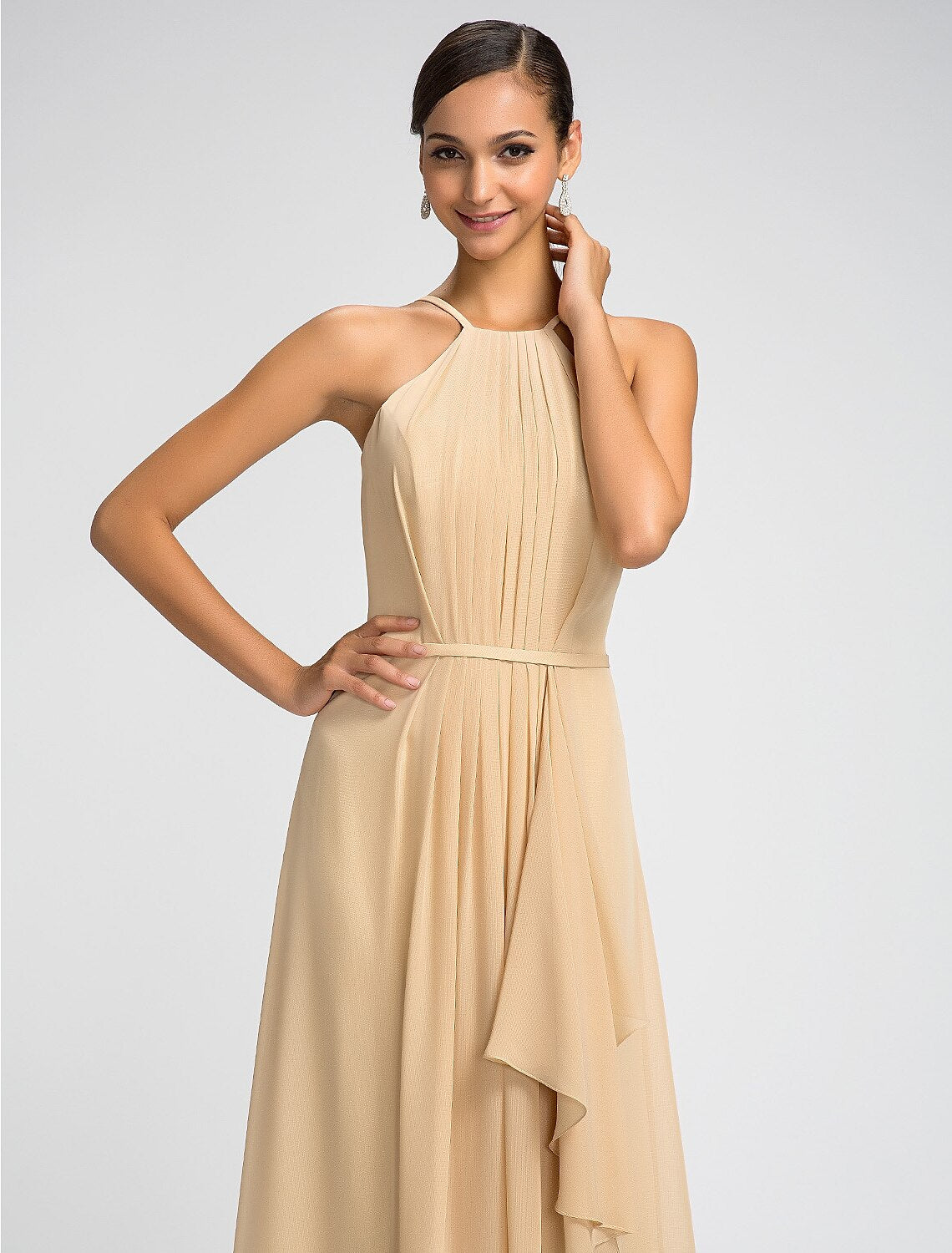 Bridesmaid dress in chiffon, showcasing the sheath silhouette and high neck.