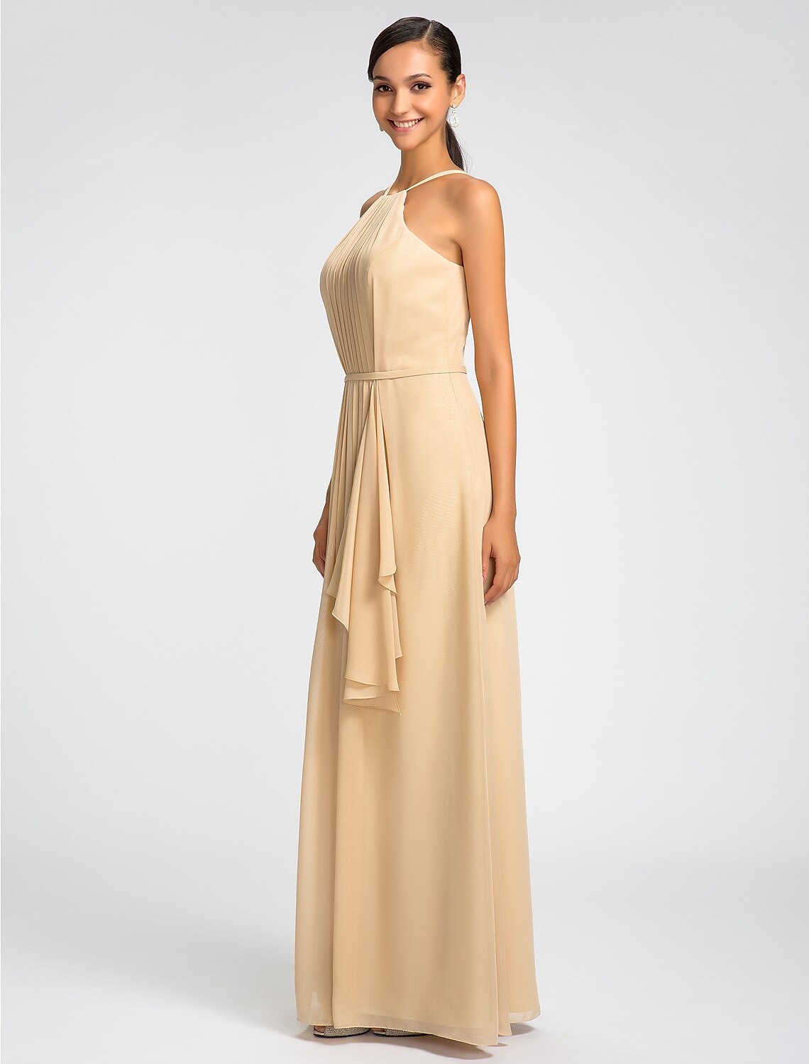 Model wearing a floor length chiffon bridesmaid dress with elegant draping.