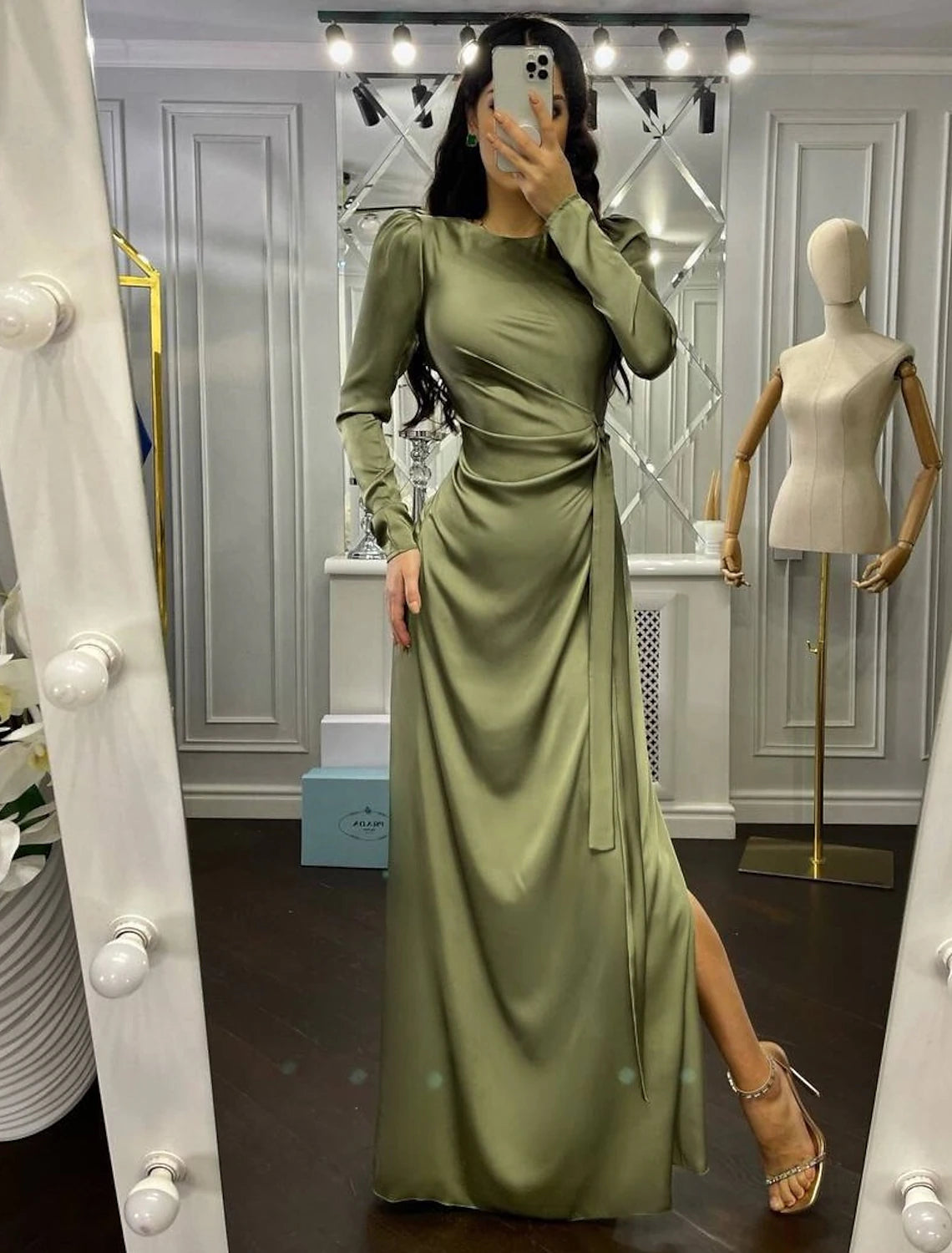 Model wearing the sophisticated fall wedding guest dress.