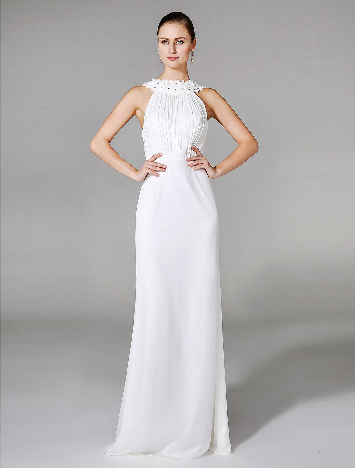 Elegant chiffon wedding dress with high neck and beading.