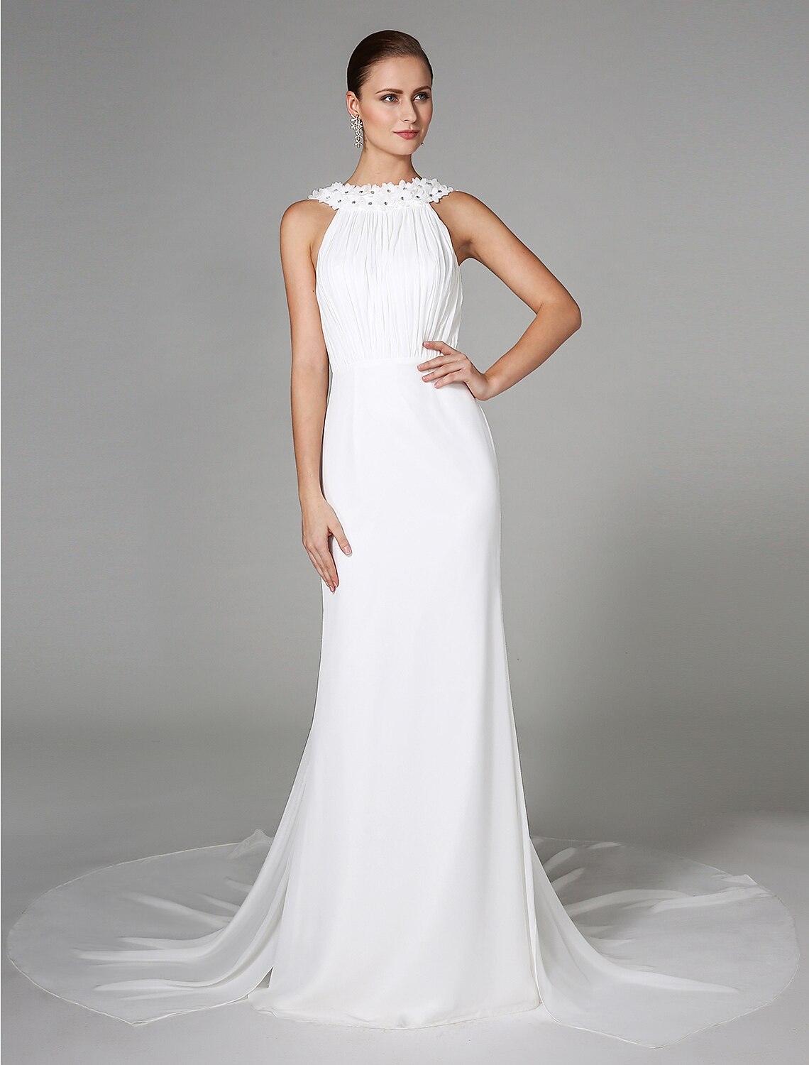 Full length view of the elegant sheath wedding dress.