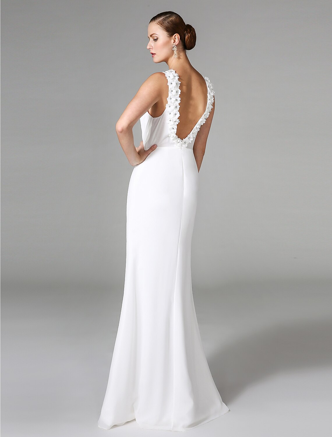 Side profile of the high neck wedding dress.