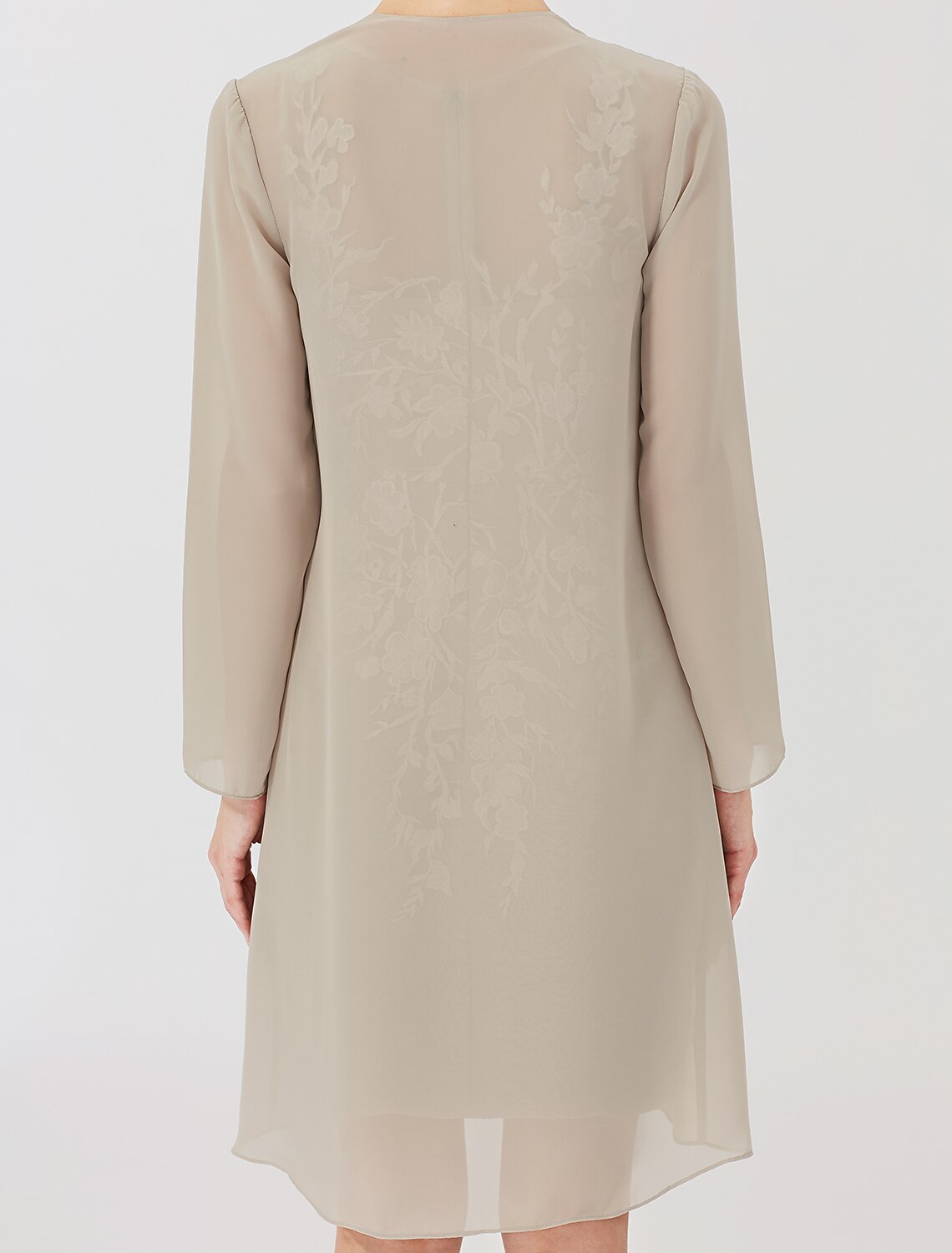 Detail of the long lace sleeves on the formal dress.