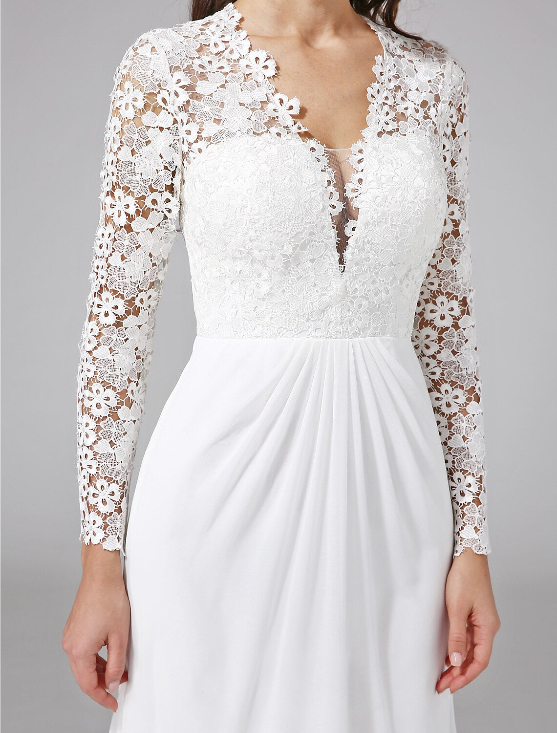 Detail of the sweep train on a boho wedding dress.