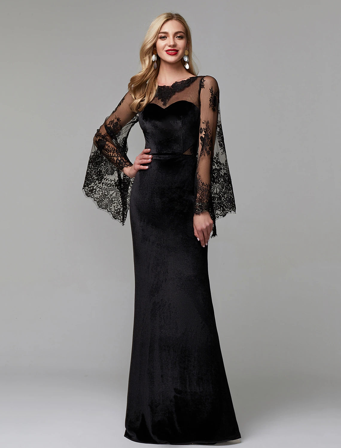 Elegant long sleeve lace sheath dress on a model.