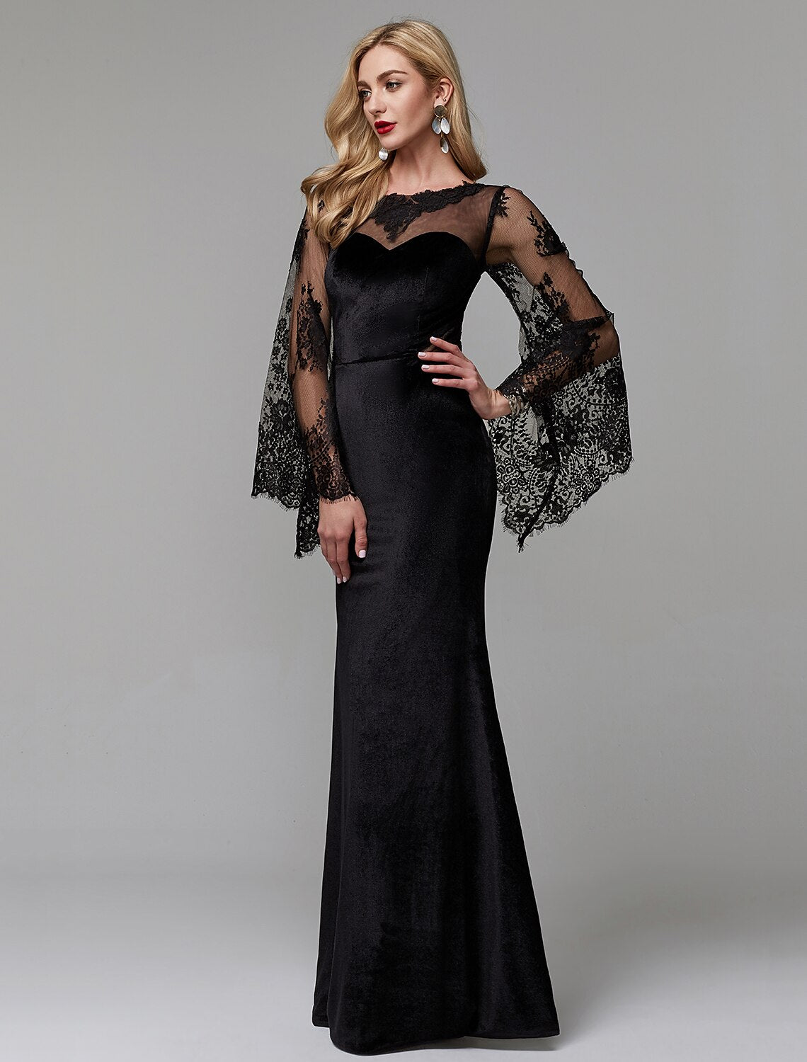 Side view of the illusion neck long sleeve dress.