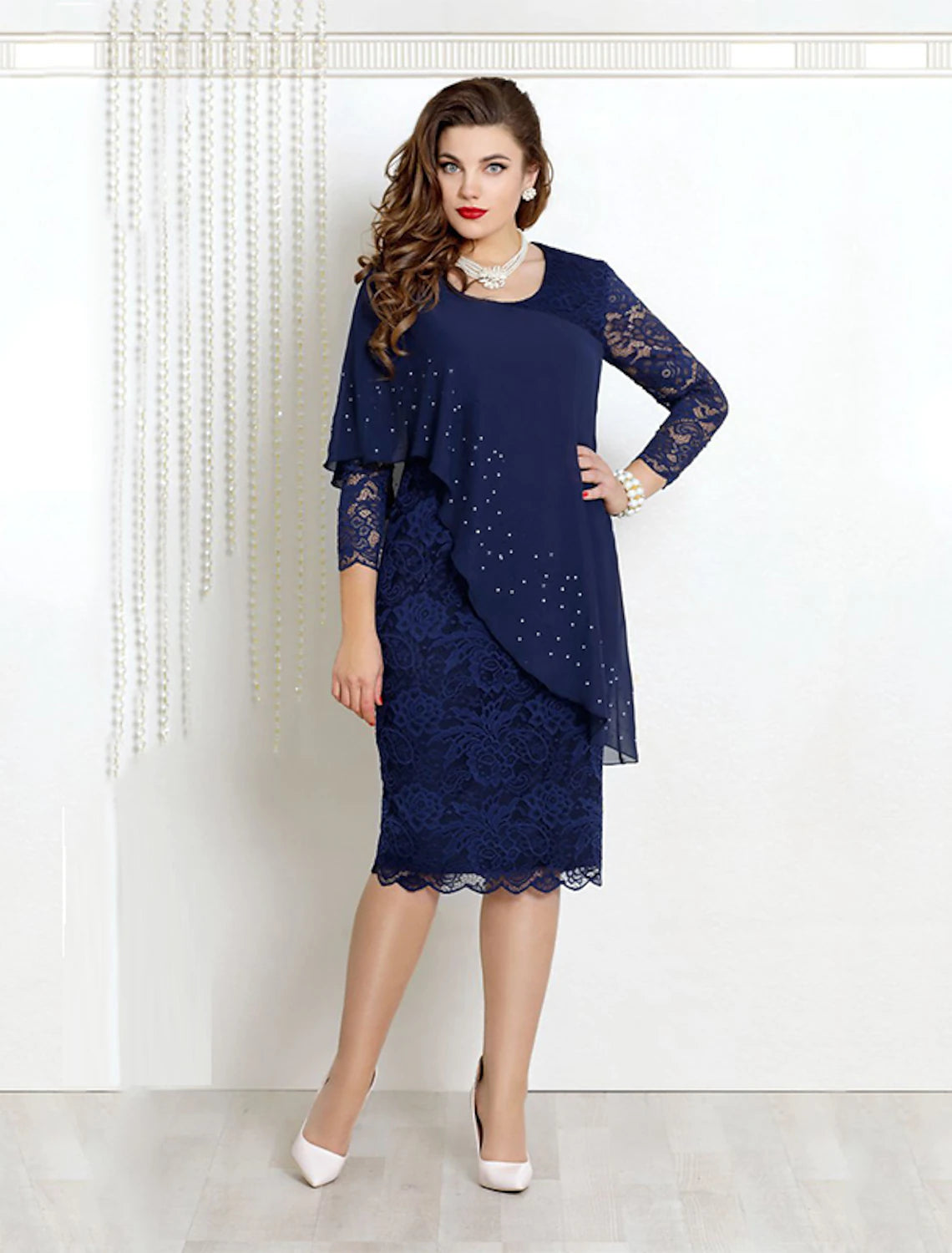 Elegant sheath Mother of the Bride dress with jewel neck and 3/4 lace sleeves.