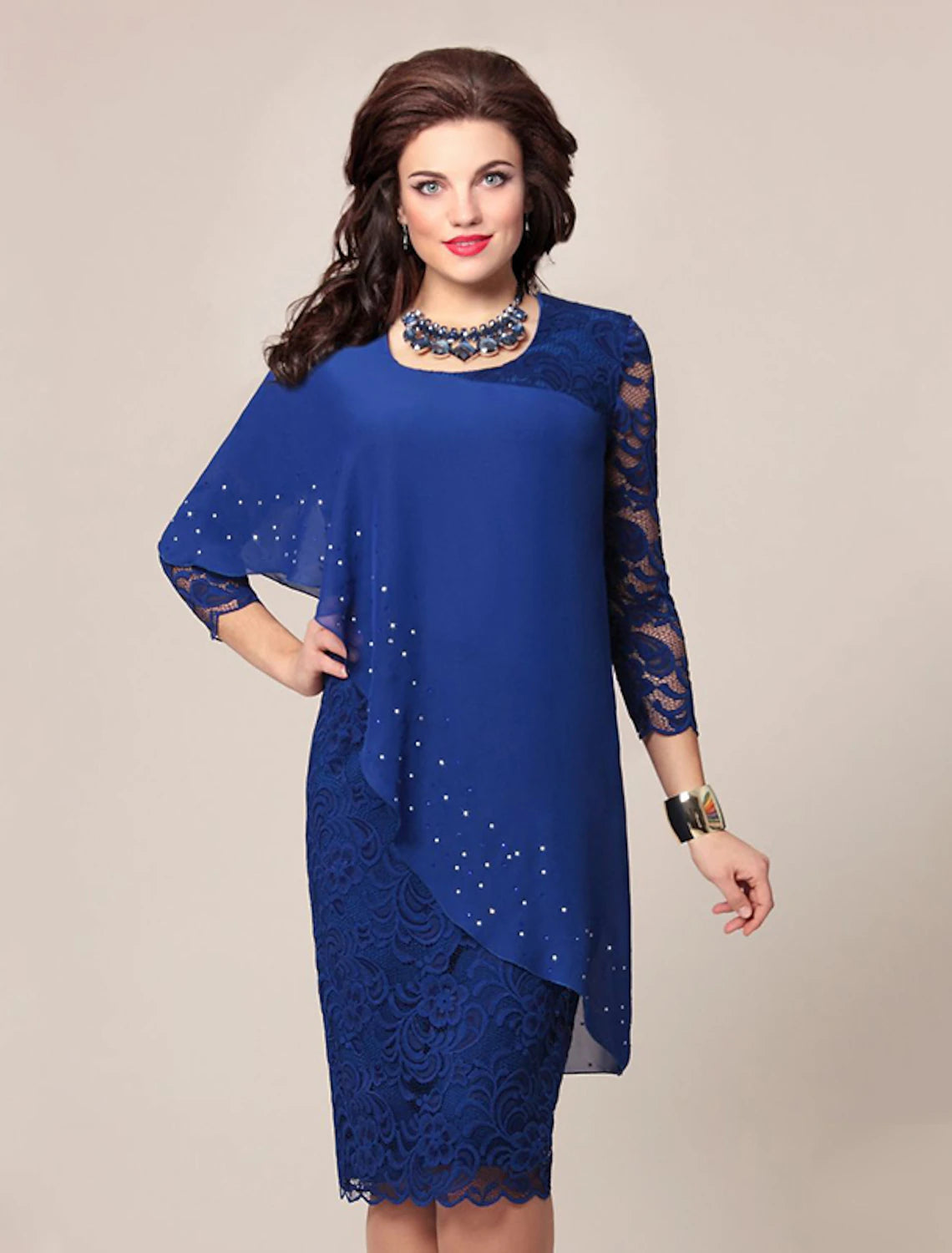 Side view of knee-length chiffon Mother of the Bride dress.
